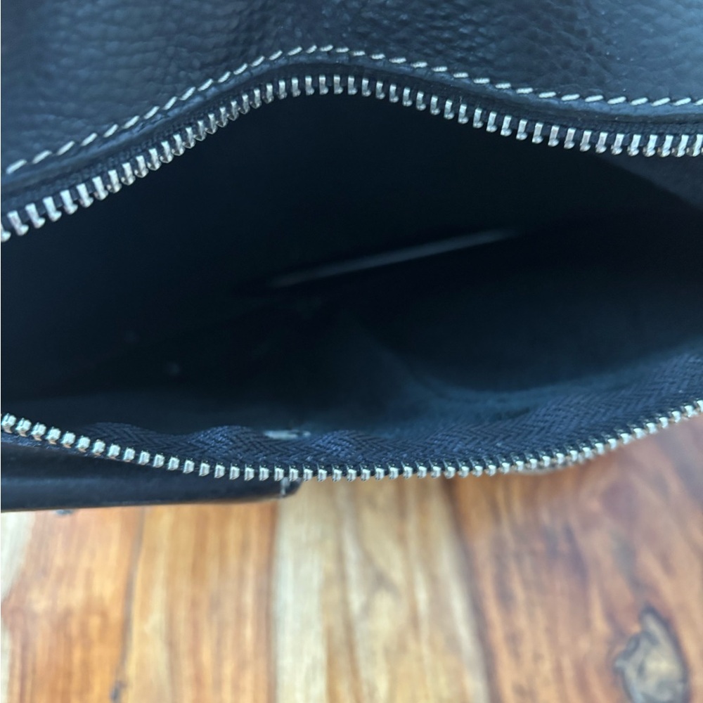 Roots Black Crossbody Bag with Silver Zipper and Smooth Interior